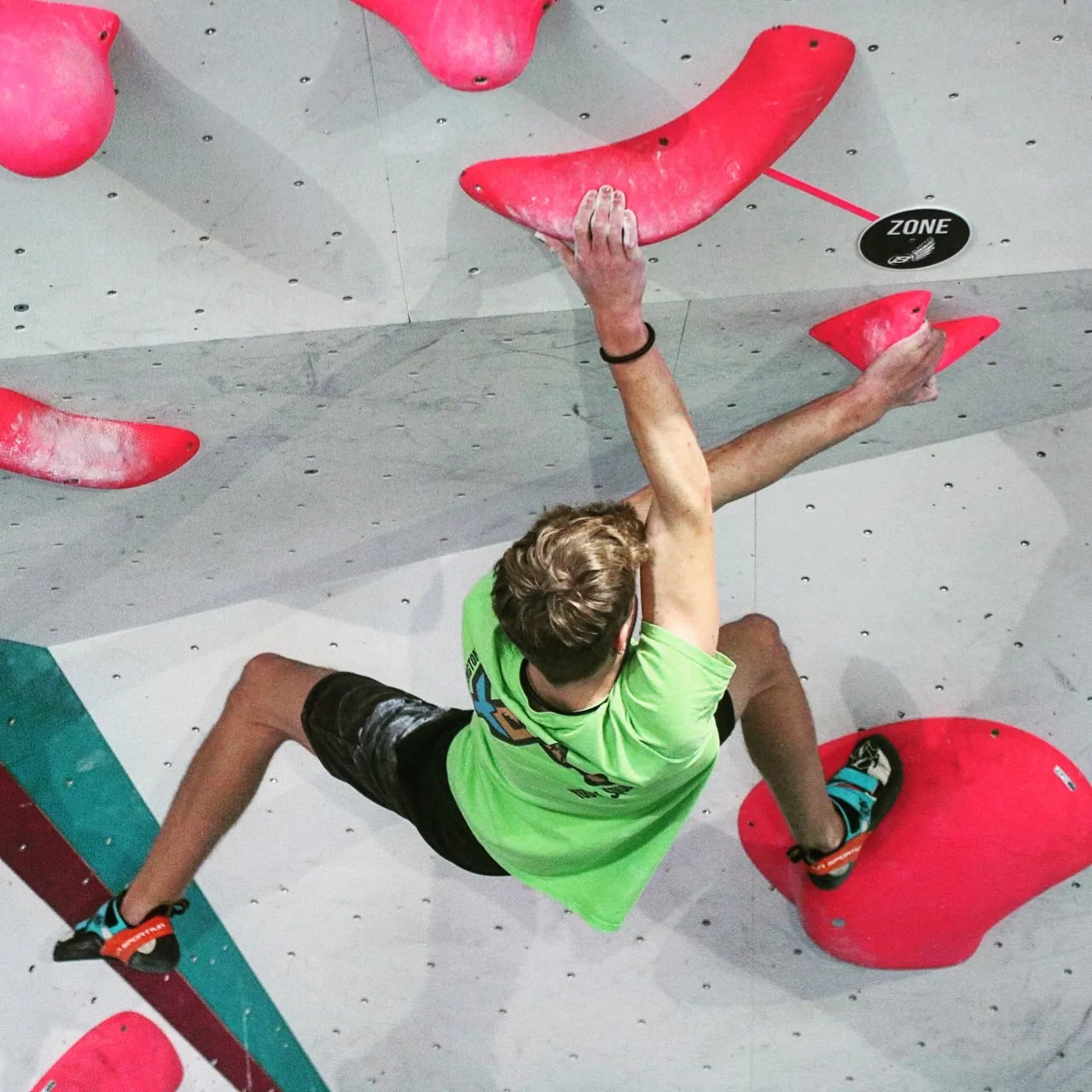 Climber competing at a Blokfest bouldering event